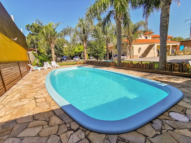 Imagen de la piscina del Hotel Pousada Magia do Sol. Foto 19