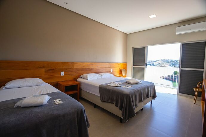 Imagen de la habitación del Hotel Pousada Mar de Minas. Foto 15