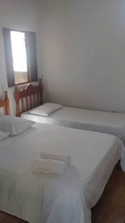 Imagen de la habitación del Hotel Pousada Mineira. Foto 13