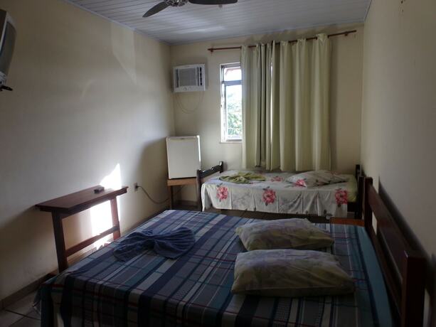 Imagen de la habitación del Hotel Pousada Mineira de Angra dos Reis. Foto 19