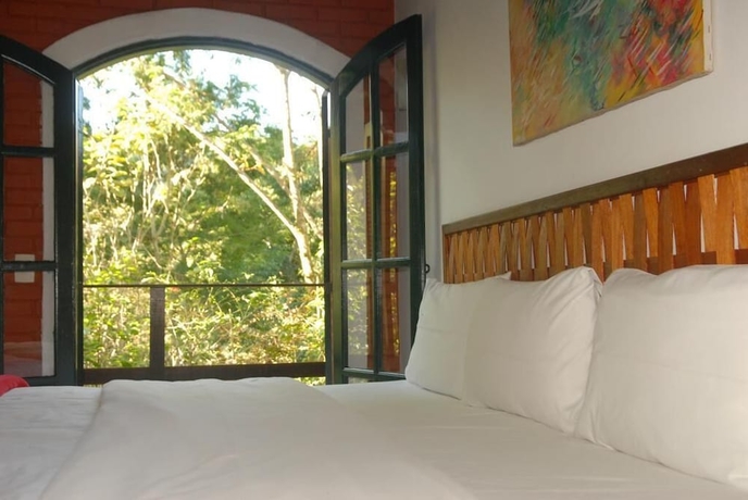 Imagen de la habitación del Hotel Pousada Mirante Do Penedo. Foto 8