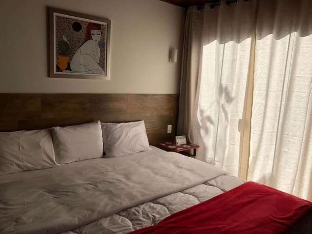 Imagen de la habitación del Hotel Pousada Mirante Do Penedo. Foto 11