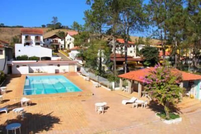 Imagen de la piscina del Hotel Pousada Montanhas do Sol. Foto 18