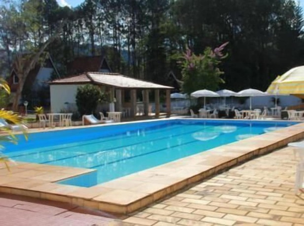 Imagen de la piscina del Hotel Pousada Montanhas do Sol. Foto 19
