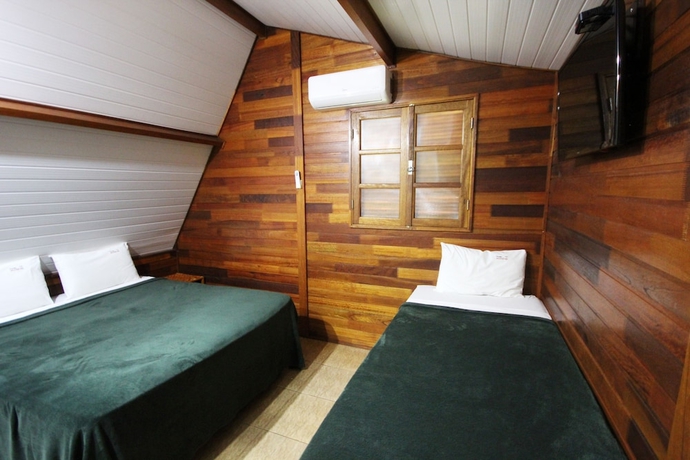Imagen de la habitación del Hotel Pousada Monte Carlo. Foto 5