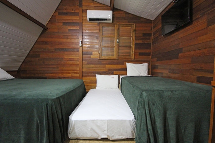 Imagen de la habitación del Hotel Pousada Monte Carlo. Foto 6