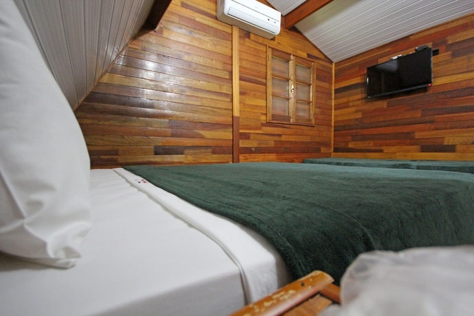 Imagen de la habitación del Hotel Pousada Monte Carlo. Foto 8