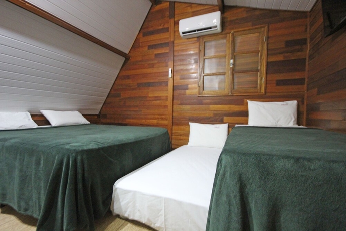 Imagen de la habitación del Hotel Pousada Monte Carlo. Foto 10