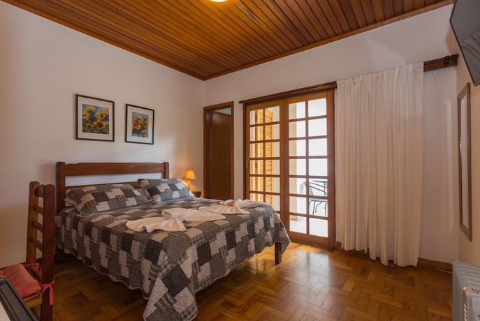 Imagen de la habitación del Hotel Pousada Morro Do Elefante, Campos do Jordao. Foto 11