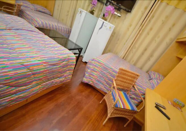 Imagen de la habitación del Hotel Pousada Morumbi. Foto 14