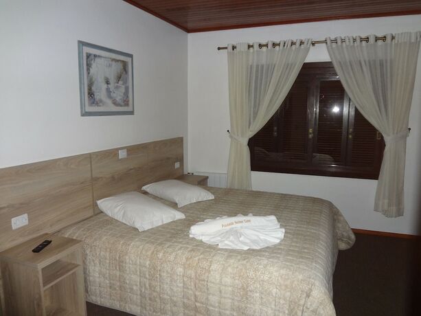 Imagen de la habitación del Hotel Pousada Nossa Casa, Gramado. Foto 15