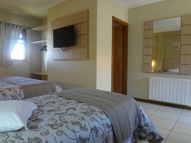 Imagen de la habitación del Hotel Pousada Nossa Casa, Gramado. Foto 18