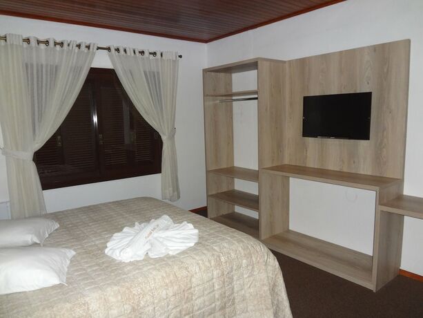 Imagen de la habitación del Hotel Pousada Nossa Casa, Gramado. Foto 20