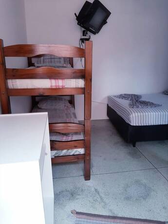 Imagen de la habitación del Hotel Pousada Nova Op&ccedil;&atilde;o, Bertioga. Foto 17
