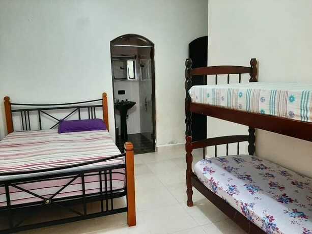 Imagen de la habitación del Hotel Pousada Nova Op&ccedil;&atilde;o, Bertioga. Foto 18