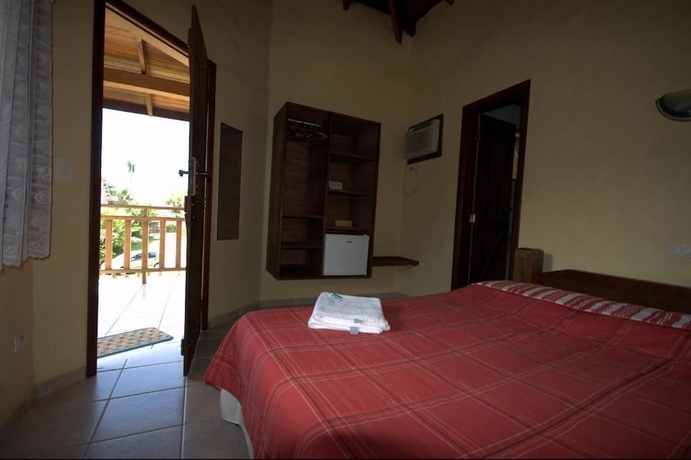 Imagen de la habitación del Hotel Pousada Nusa Dua Maresias. Foto 7