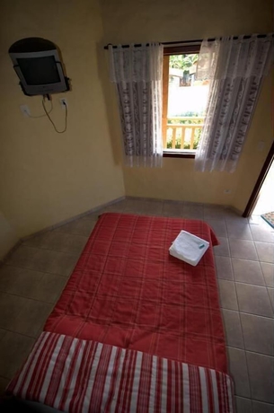 Imagen de la habitación del Hotel Pousada Nusa Dua Maresias. Foto 9