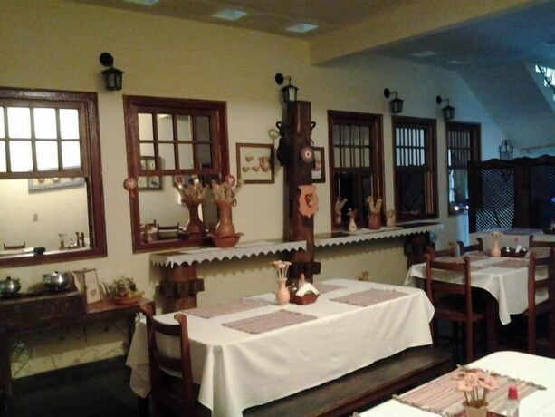 Imagen del bar/restaurante del Hotel Pousada Ouro De Minas. Foto 22