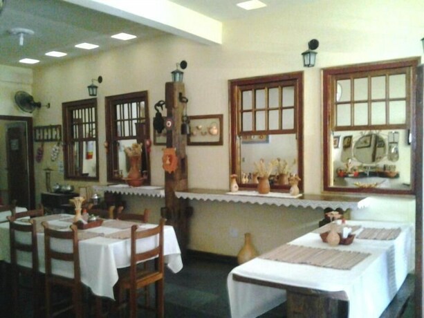 Imagen del bar/restaurante del Hotel Pousada Ouro De Minas. Foto 24