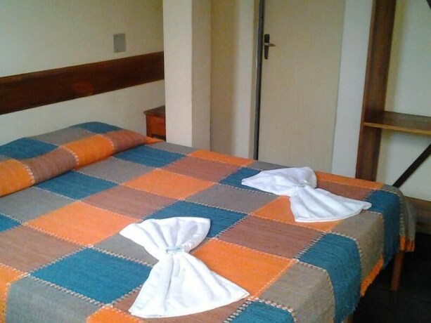 Imagen de la habitación del Hotel Pousada Ouro De Minas. Foto 25