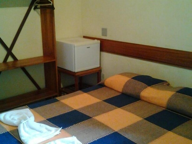 Imagen de la habitación del Hotel Pousada Ouro De Minas. Foto 29