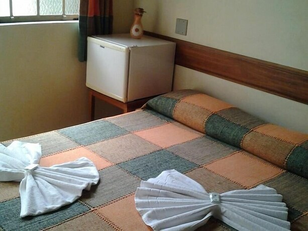 Imagen de la habitación del Hotel Pousada Ouro De Minas. Foto 31