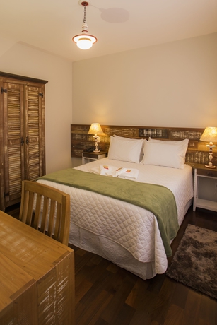 Imagen de la habitación del Hotel Pousada Ouro De Minas, Tiradentes. Foto 7