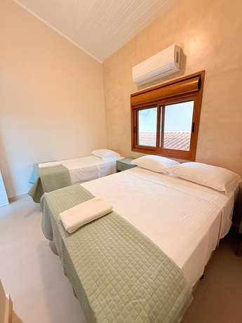 Imagen de la habitación del Hotel Pousada Pantai Maresias. Foto 10