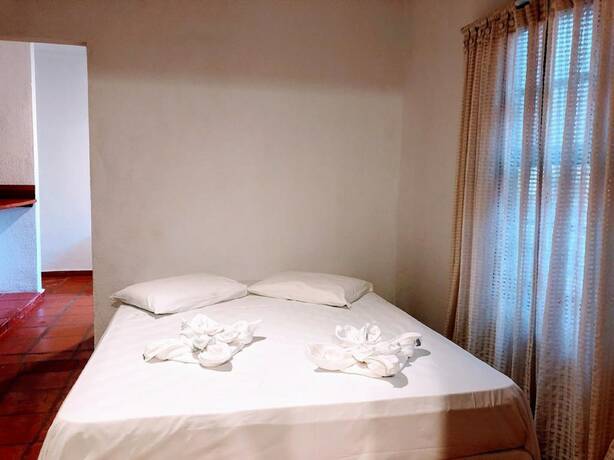 Imagen de la habitación del Hotel Pousada Papaya, Ubatuba. Foto 17