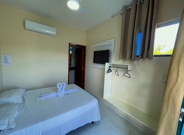 Imagen de la habitación del Hotel Pousada Papito Ubatuba - Praia Perequ&ecirc;-a&ccedil;u. Foto 5
