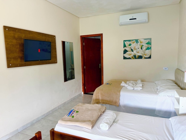Imagen de la habitación del Hotel Pousada Papito Ubatuba - Praia Perequ&ecirc;-a&ccedil;u. Foto 6