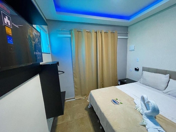 Imagen de la habitación del Hotel Pousada Papito Ubatuba - Praia Perequ&ecirc;-a&ccedil;u. Foto 8