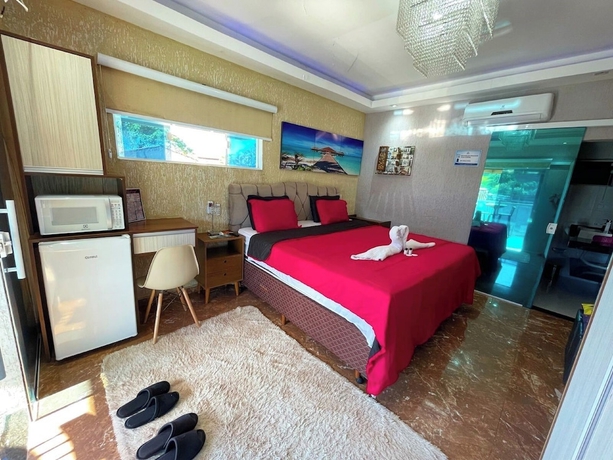 Imagen de la habitación del Hotel Pousada Papito Ubatuba - Praia Perequ&ecirc;-a&ccedil;u. Foto 10