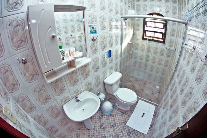 Imagen de la habitación del Hotel Pousada Paradise, Caraguatatuba. Foto 7