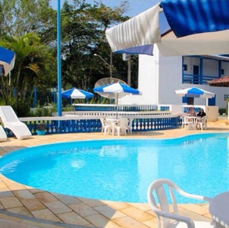 Imagen de la piscina del Hotel Pousada Parthenon Ubatuba. Foto 16