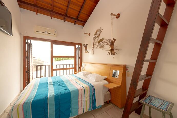 Imagen de la habitación del Hotel Pousada P&eacute; na Areia, Caraguatatuba. Foto 16
