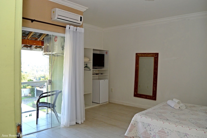 Imagen de la habitación del Hotel Pousada Penedo House. Foto 8