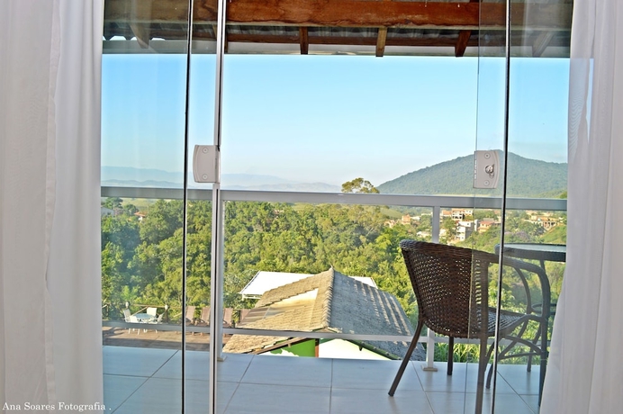 Imagen de la habitación del Hotel Pousada Penedo House. Foto 13