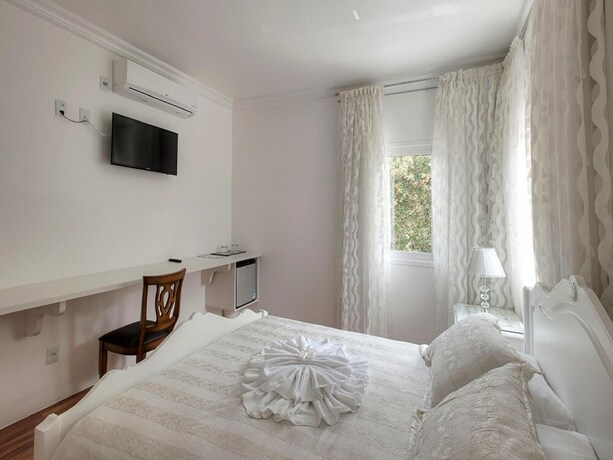 Imagen de la habitación del Hotel Pousada Perfume De Canela. Foto 18