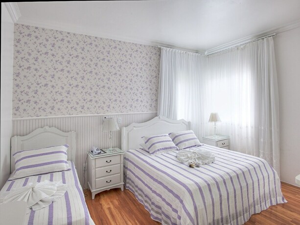 Imagen de la habitación del Hotel Pousada Perfume De Canela. Foto 23