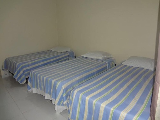 Imagen de la habitación del Hotel Pousada Pg One. Foto 17