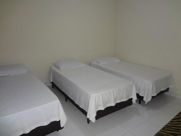 Imagen de la habitación del Hotel Pousada Pg One. Foto 25