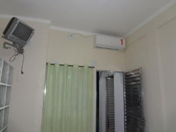 Imagen de la habitación del Hotel Pousada Pg One. Foto 27