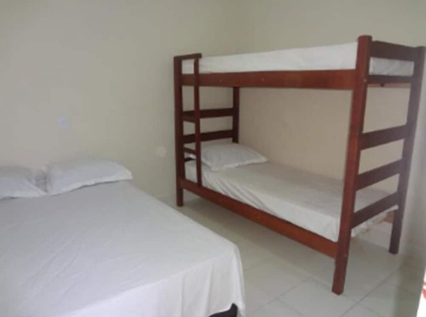 Imagen de la habitación del Hotel Pousada Pg One. Foto 31