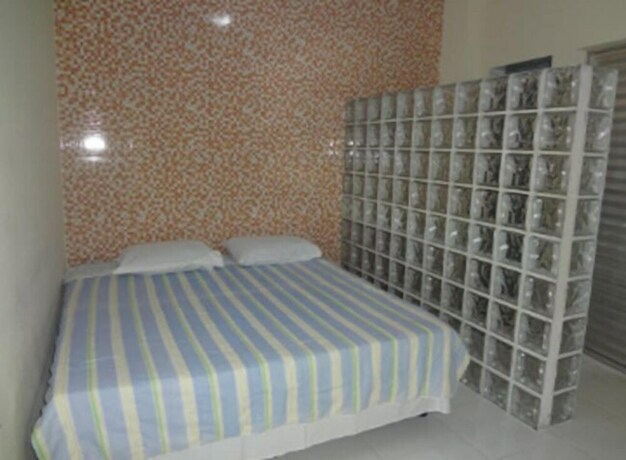 Imagen de la habitación del Hotel Pousada Pg One. Foto 32