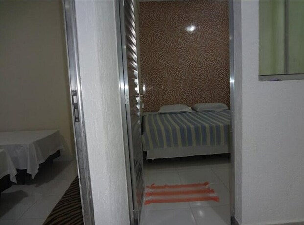 Imagen de la habitación del Hotel Pousada Pg One. Foto 36