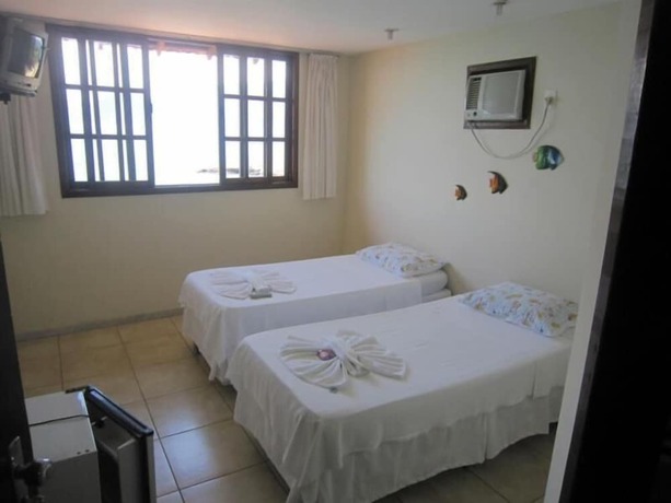 Imagen de la habitación del Hotel Pousada Pier 7400. Foto 14
