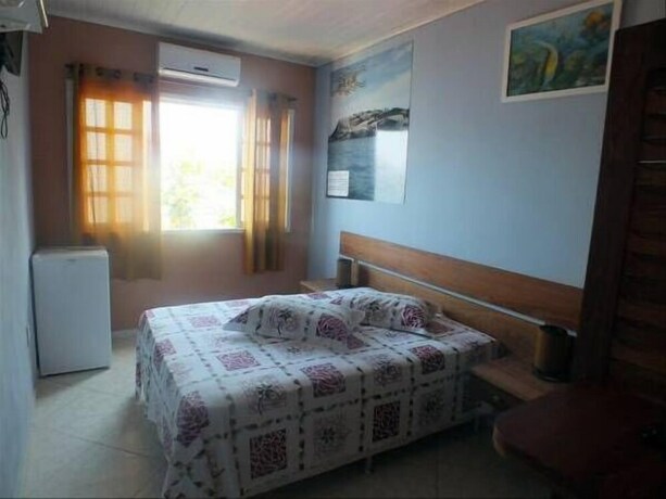 Imagen de la habitación del Hotel Pousada Plat&ocirc;dasilhas. Foto 34
