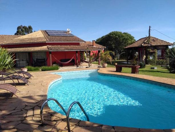 Imagen de la piscina del Hotel Pousada Por do Sol, Camanducaia. Foto 20