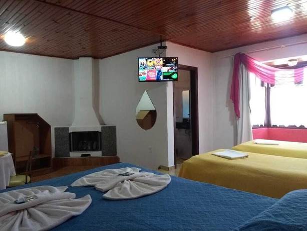 Imagen de la habitación del Hotel Pousada Por do Sol, Camanducaia. Foto 9